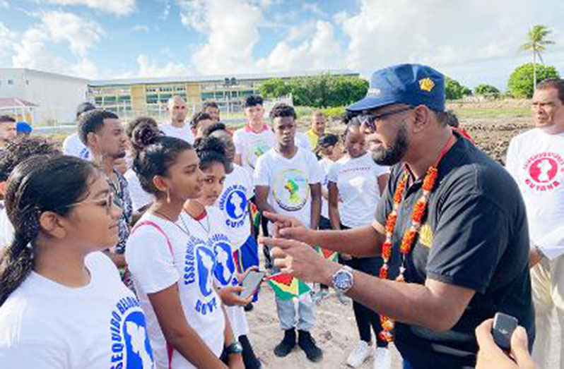 President, Dr. Irfaan Ali interacts with Region Two youths who participated in the Day of Public Awareness and Prayer that was recently observed across the country