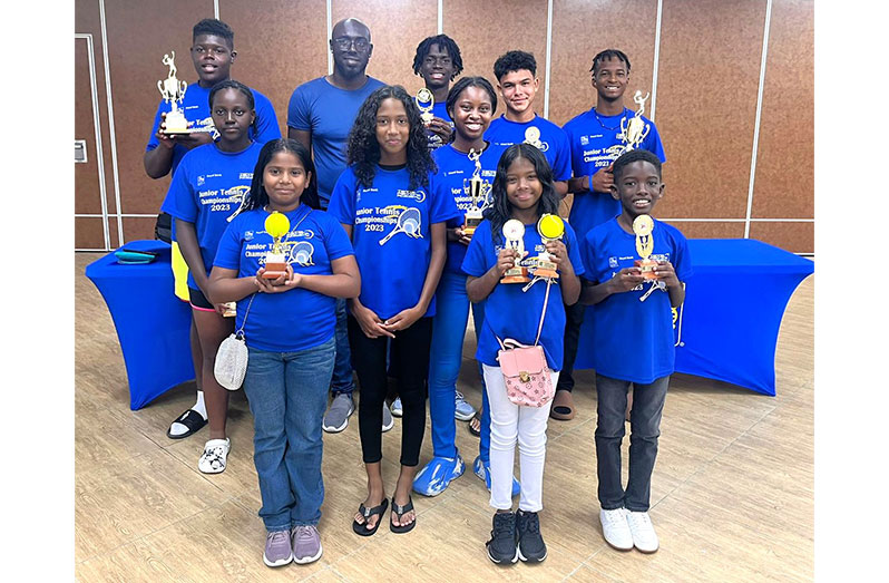 From top left: Denzel Luthers, Coach Andre Erskine, Bradford Fordyce, Jose Rodrigues, Gerald Scotland, Paul Kalekeyzi, Niomi Erskine, Kimora Erskine, Nandica Arjune, Israbella Grannum, and Michael Fordyce