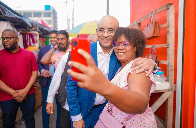Vice President Dr. Bharrat Jagdeo interacted with business owners, shoppers and commuters during his customary walkabout of downtown Georgetown shopping areas on Friday. Dr. Jagdeo navigated the bustling streets, forging connections and understanding the diverse needs of the people. He was actively involved in the heartbeat of the city, fostering a sense of unity and shared purpose.