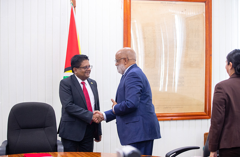 Senior Finance Minister Dr. Ashni Singh greets the new Inter-American Development Bank’s (IDB) General Manager for the Caribbean Country Department (CCB), Anton Edmunds (Ministry of Finance photo)