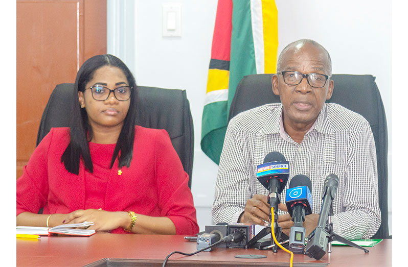 Labour Minister Joseph Hamilton (right), Permanent Secretary of the Labour Ministry, Mae Toussaint Jr. Thomas-Meerabux (left)