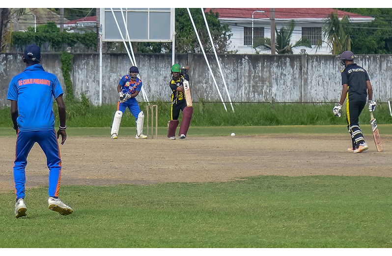 Raymond Pereez drives during his unbeaten 32 yesterday at Bourda