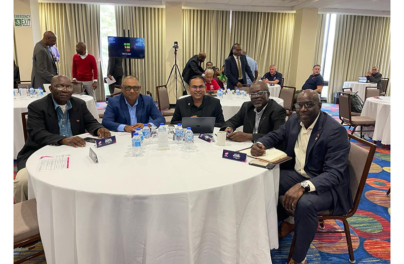 (Second from left) Deputy Commissioner 'Operations' (ag.), Ravindradat Budhram, alongside Dr Sawan Jagnarain flanked by other regional representatives at the Security, Safety, and Medical Summit held in Trinidad