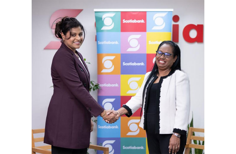 Nafeeza Gaffoor, Country Manager of Scotiabank Guyana (left) and Jennifer Massiah, National Director, Habitat for Humanity, celebrate the partnership, which will see youth across Guyana benefitting from Construction Technology and Disaster Risk Reduction Training
