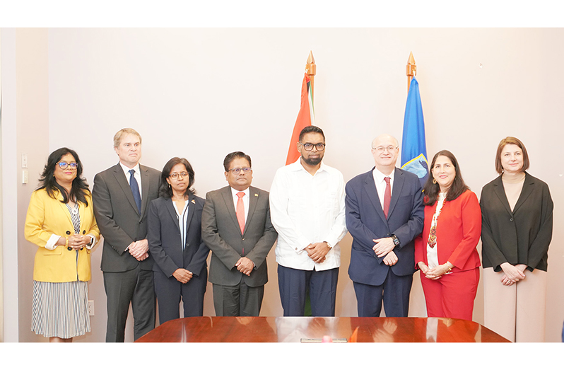 President Dr. Irfaan Ali (fourth from right), Senior Minister in the Office of the President with responsibility for Finance and Public Service, Dr. Ashni Singh (fourth from left), IDB President, Ilan Goldfajn (third from right) and other officials after the six new agreements were inked (IDB Photo)