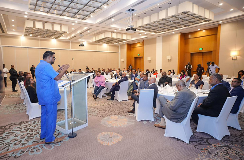 President Dr Mohamed Irfaan Ali speaking to the father Monday evening, during the Private Sector Commission’s (PSC) Corporate Dinner at the Guyana Marriott Hotel, Kingston, Georgetown