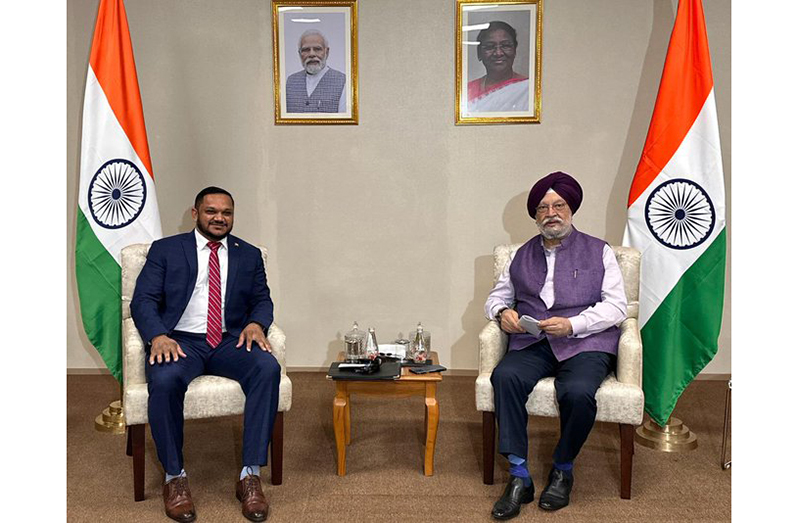 Natural Resources Minister, Vickram Bharrat, with Hardeep Singh Puri, India's Minister of Housing and Urban Affairs and Minister of Petroleum and Natural Gas