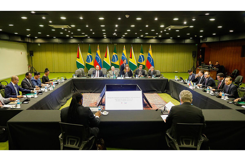 Flashback:  Representatives of the Guyana and Venezuela governments during the January meeting in Brazil (Photographer: Sergio Lima/AFP/Getty Images)