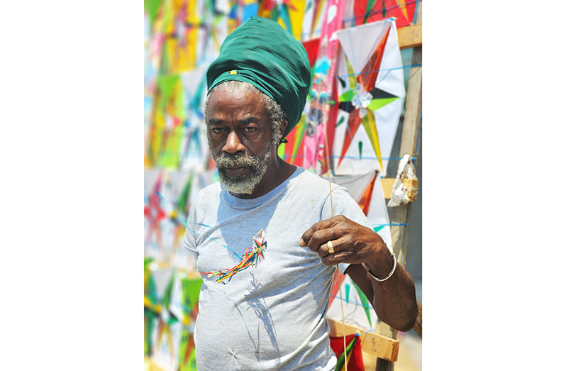 Maurice Prince with one of his signature miniature kite creations (Samuel Maughn photos)