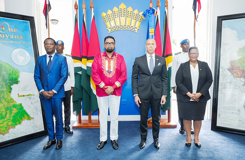 President Dr Irfaan Ali (second, left) with Dominican Republic Ambassador to Guyana, Ernesto Torres-Pereyra (third, left); Foreign Affairs Minister Hugh Todd (extreme left) and Ambassador Elizabeth Harper (extreme right)