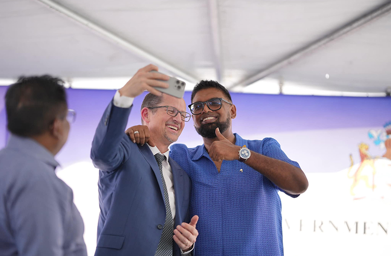 President Dr. Irfaan Ali (right) and the CEO of Coursera Inc., Jeff Maggioncalda, take a selfie