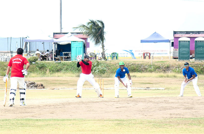 Sports Minister Charles Ramson cuts Garvin Nedd during entertaining 39 on his home ground yesterday (Japheth Savory photo)