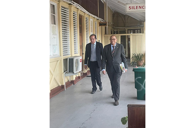 Court-appointed mediators Senior Counsel Robin Stoby and Senior Counsel Edward Luckhoo (left) as they left the courthouse on Monday evening