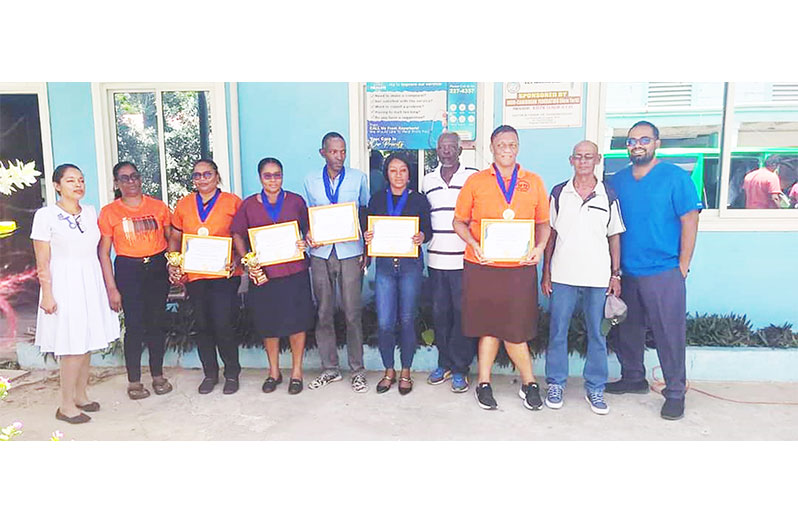 The awardees pose with hospital and RHTYSC officials