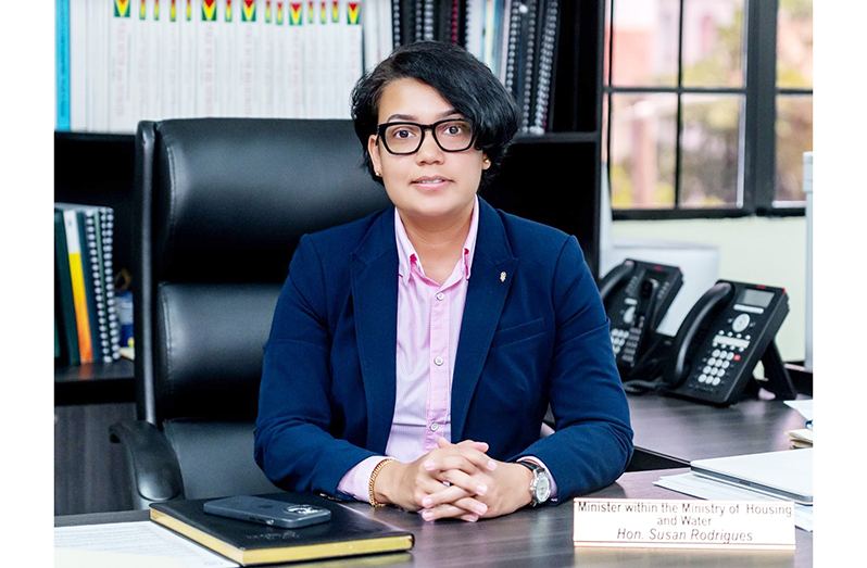 Minister Within the Ministry of Housing and Water, Susan Rodrigues perched in her office (Delano Williams photo)