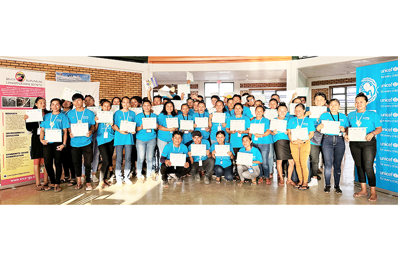 Participants at the Youth Climate Change Forum in Lethem pose with certificate of participation at the end of the three-day activity