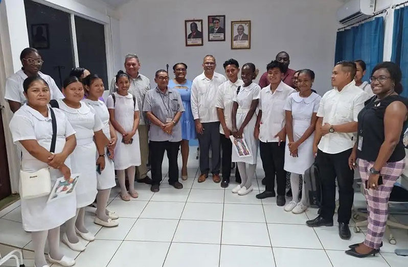 Minister of Health Dr. Frank Anthony with nurses and other health workers from the Lethem Regional Hospital