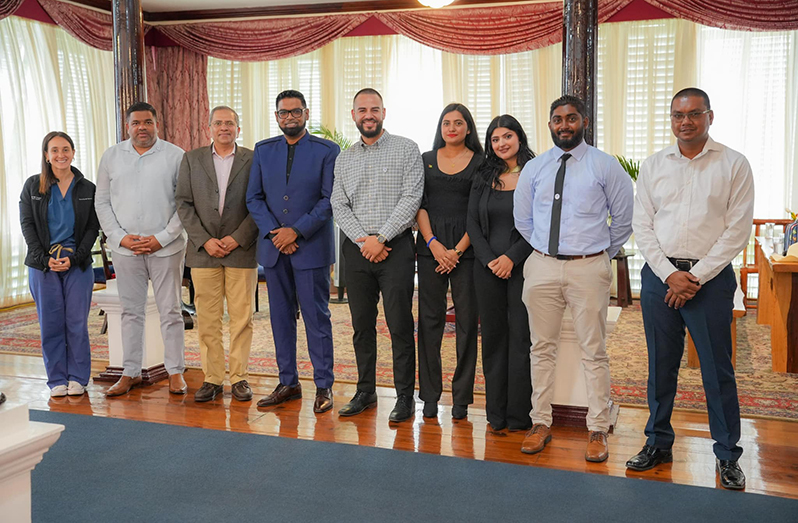 President Dr. Irfaan Ali (fourth left) met with the Northwell Health and GPHC teams on Tuesday (Office of the President photo)