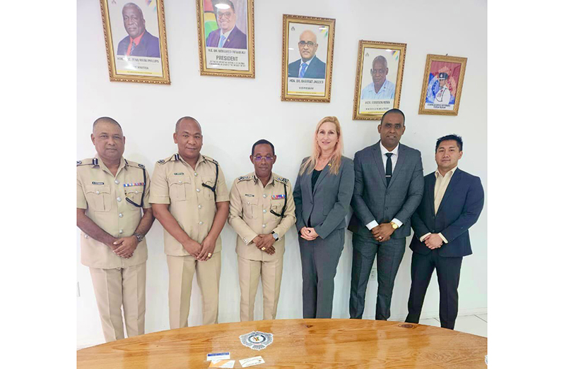 Police Commissioner (ag), Clifton Hicken (third from left) with US Ambassador Nicole Theriot (fourth from left) and other officials at their meeting (GPF photo)
