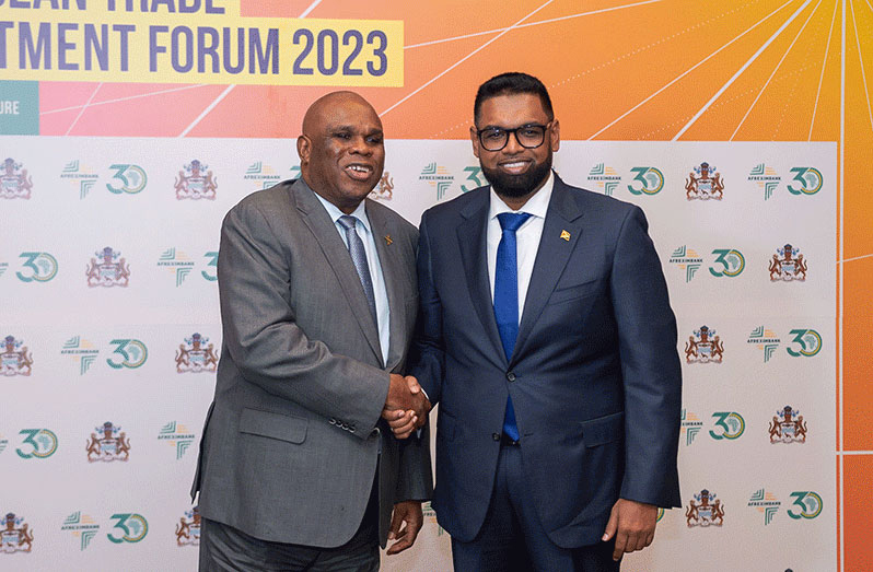 President Dr Irfaan Ali (right) and President and Chairman of the Board of Directors of the Afreximbank, Professor Benedict Oramah during the 2023 ACTIF (Delano Williams photo)