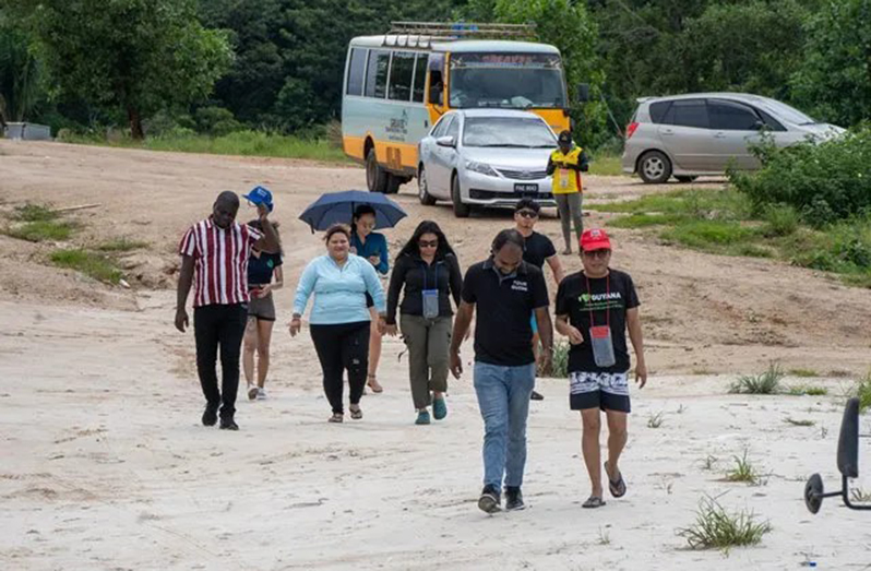 Representatives of the Guyana Tourism Authority accompany Deon Anderson and a team from the local media to the blue lakes, for the launch of a new experience