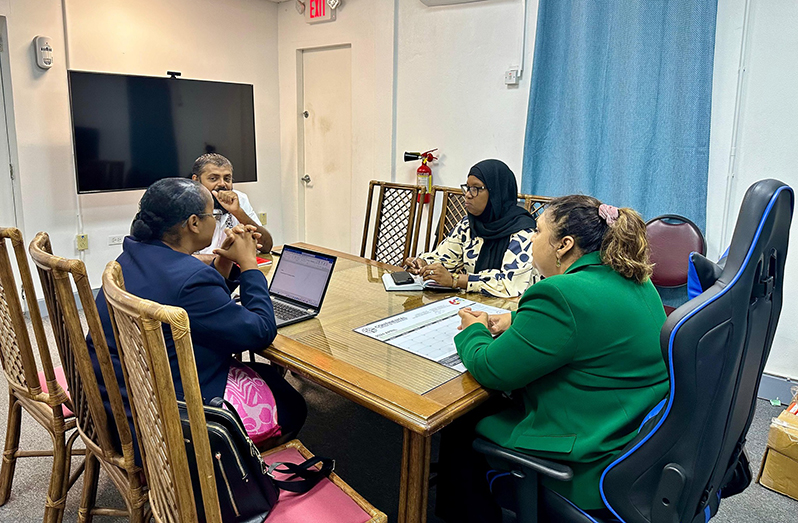 The Minister of Education, Priya Manickchand; Chief Education Officer, Saddam Hussain; Dr. Nicole Manning from the Caribbean Examinations Council (CXC); and Superintendent of Exams, Sauda Kadir