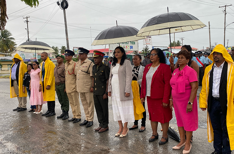 Minister of Human Services and Social Security, Dr Vindhya Persaud, along with regional officials at the flag-raising ceremony