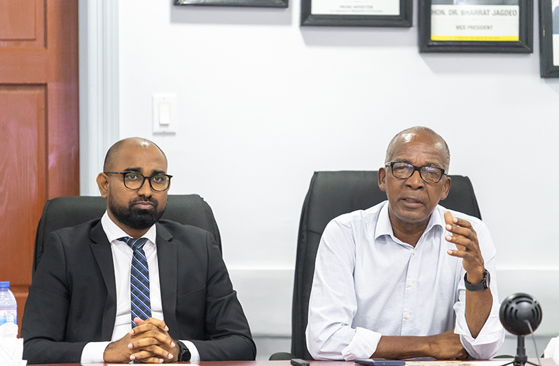 From Left:  CLO, Ministry of Labour, Dhaneshwar Deonarine and Minister of Labour, Joseph Hamilton, during the launch of ‘Labour Advice’ application (Delano Williams photo)