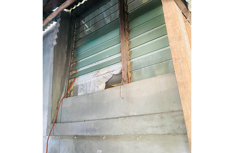 The window the bandits used to gain entry into Prampattie Mawram’s house at Golden Fleece Estate, Region Two