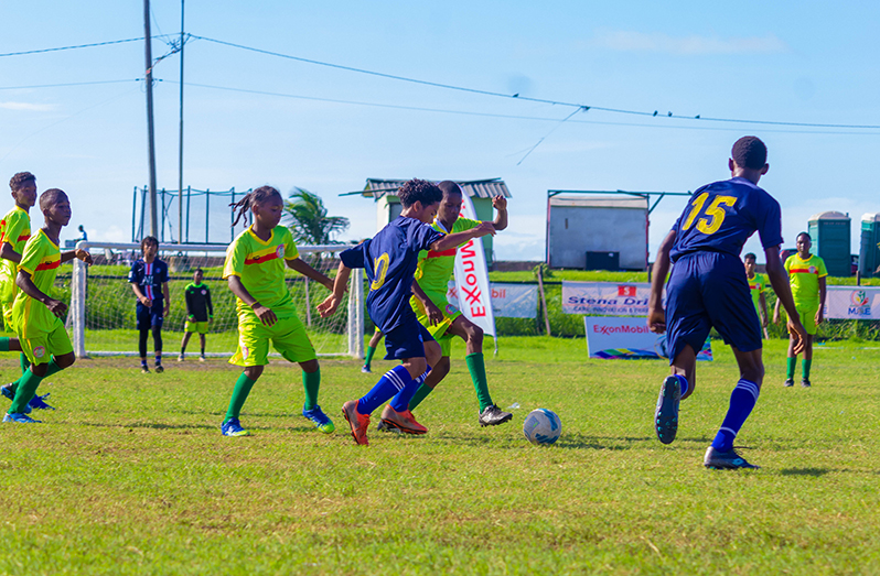 Action in the ExxonMobil U14 tournament (Shaniece Bamfield photo)