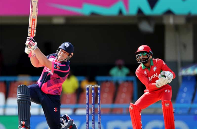 Munsey on the attack against Oman (Photo: ICC via Getty Images)