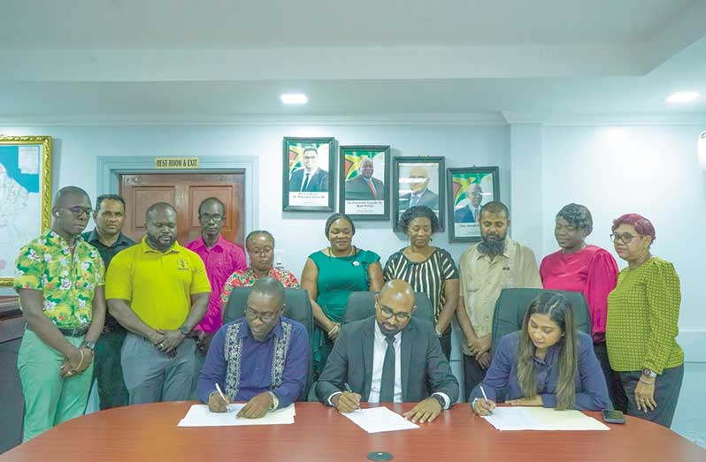 From left to right: President of the GTU, Mark Lyte; Chief Labour Officer (CLO), Dhaneshwar Deonarine and Permanent Secretary of the Education Ministry, Shannielle Hoosein-Outar, among other officials from the Education Ministry and GTU