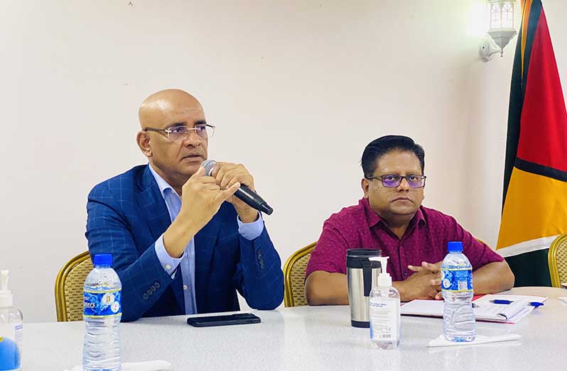 Vice President Dr. Bharrat Jagdeo and Senior Minister in the Office of the President with responsibility for Finance, Dr. Ashni Singh, during the meeting with Region Two contractors