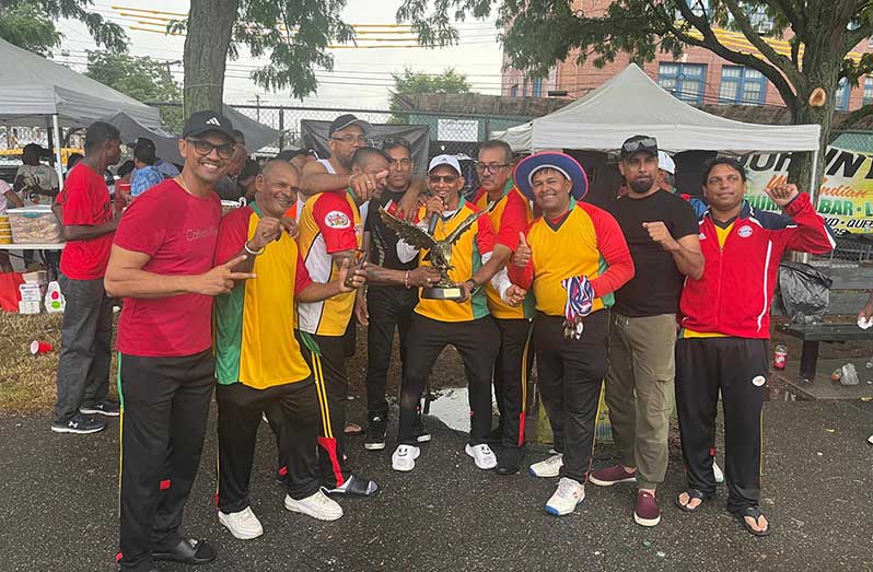 The victorious Trophy Stall Lions pose with their winning Eagle