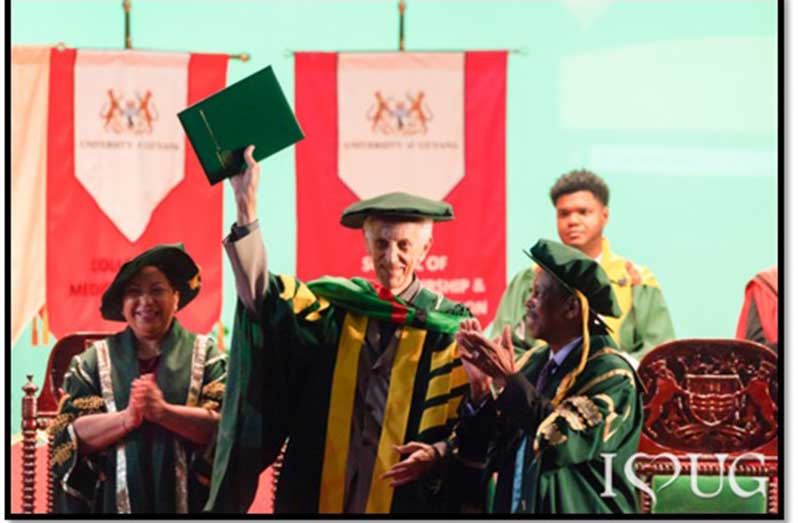 Dave Martins after he was conferred with the prestigious University of Guyana’s Honorary Doctorate in Arts and Letters in 2022. Also in photo are Vice-Chancellor, Prof. Paloma Mohamed Martin (L) and Chancellor, Prof. Edward Greene