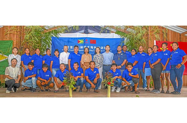 Minister of Tourism, Industry, and Commerce, Oneidge Walrond, Chinese Ambassador to Guyana Guo Haiyan, participants of the training course, trainers and Toshao Christopher Gouveia following the opening ceremony