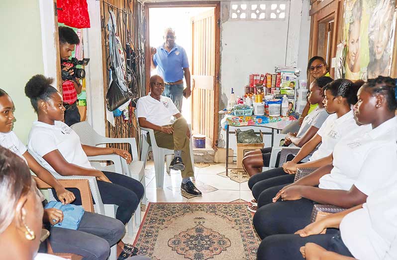 Minister of Labour Joseph Hamilton speaks to one of several groups participating in the   ongoing training programmes facilitated by the Board of Industrial Training (BIT)