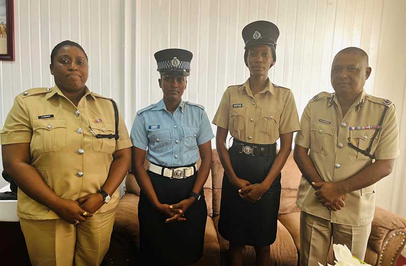 Deputy Commissioner (ag) ‘Administration’, Ravindradat Budhram (extreme right) and Woman Superintendent Sonia Herbert, Director of the Guyana Police Force’s Academy (extreme left) with Woman Constable Devika Moosai and Woman Special Constable Leslyn Lashley-Bobb