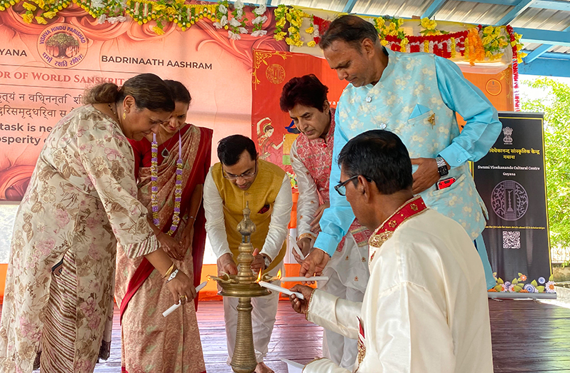 India's High Commissioner to Guyana, Dr. Amit Telang, and his wife, Dr. Deepali Telang, attended, along with Shri Munesh Dhanraaj, founder of the Badrinaath Ashram, pandit Kaydar Persaud and Shri Rudra Jayanta Bhagawati, Director of the Swami Vivekananda Cultural Centre lighting the lamp