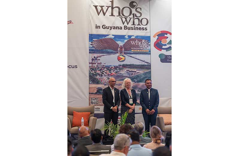 From left: Chairman of ActionINVEST, Dr. Vishnu Doerga, British High Commissioner to Guyana, Jane Miller and Guyana’s Chief Investment Officer, Dr. Peter Ramsaroop following the unveiling of the 2025 edition of the Who’s Who in Guyana Business Directory (Delano Williams photo)