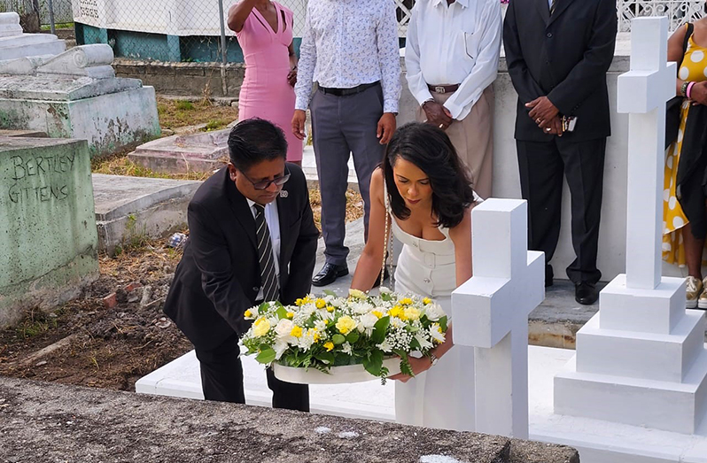 Senior Minister in the Office of the President with Responsibility for Finance and the Public Service, Dr Ashni Singh and President of the Queen’s College (QC) Old Students’ Association (QC-OSA), Pauline Chase, laying a wreath at the grave site of Lord Bishop William Piercy Austin, the school’s founder (MoF photo)