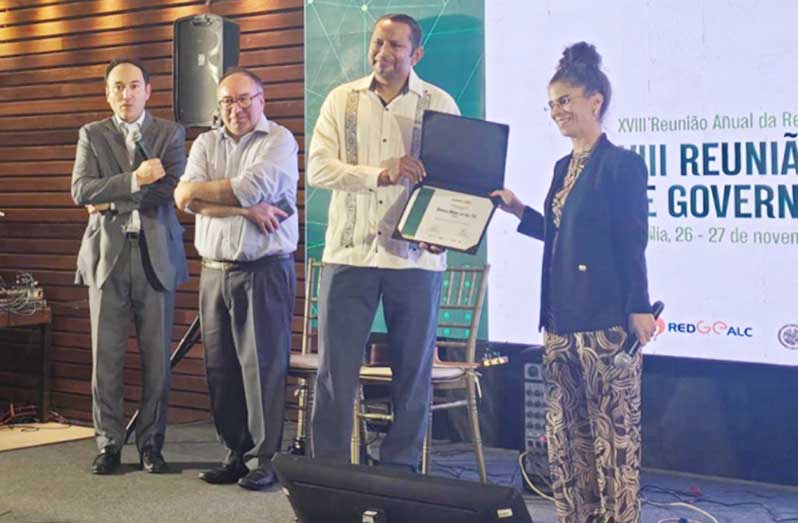 NDMA General Manager Christopher Deen receiving the Recognition Award for the ‘Girls in ICT’ programme at the Eighth Ministerial Meeting on Digital Government of the Americas, in Brazil