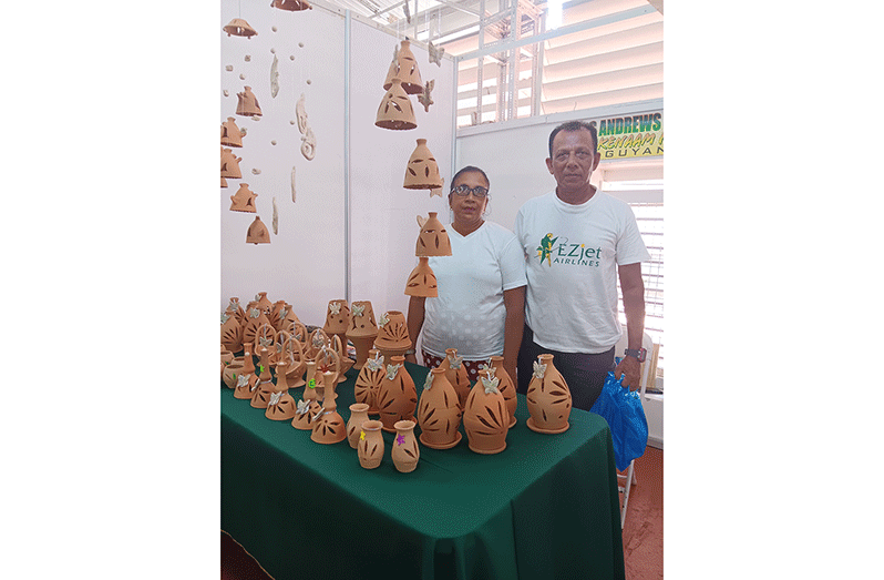 Nandkishore and his wife Sara Andrews at their booth at GuyExpo