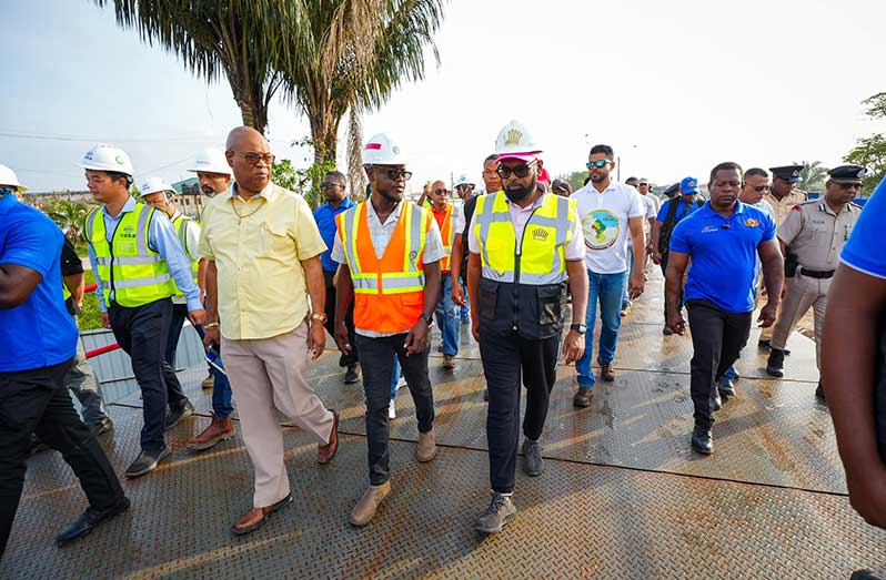 President Dr. Irfaan Ali and several government ministers being briefed on several ongoing projects in Linden, Region Ten