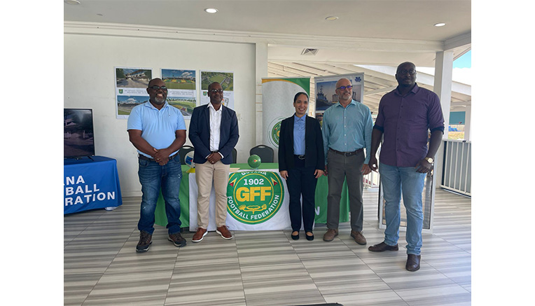 Officials from SRKN’gineering and Associates Limited along with the top brass of the Guyana Football Federation at the National Training Facility on Friday