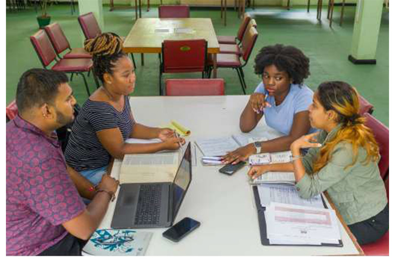 University of Guyana students engage in collaborative learning at the Turkeyen Campus Library