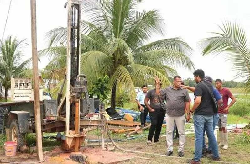 Minister of Housing and Water, Collin Croal, during a site visit to the well