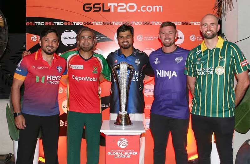 The Captains with the ExxonMobil GGSL Trophy on Tuesday night (GAW Skipper 46-year old Imran Tahir is second from left) (NEWSROOM PHOTO)