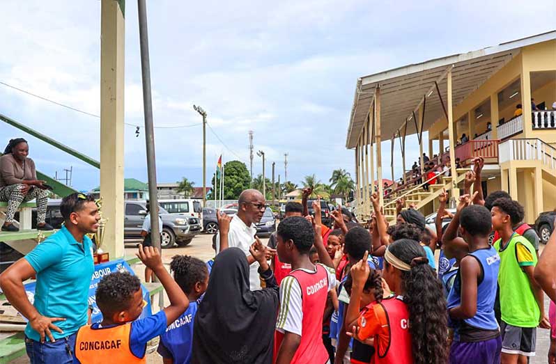 Minister of Labour, Joseph Hamilton, was on hand to cheer on the young footballers, present trophies to the winning teams, and share words of encouragement with the energetic crowd