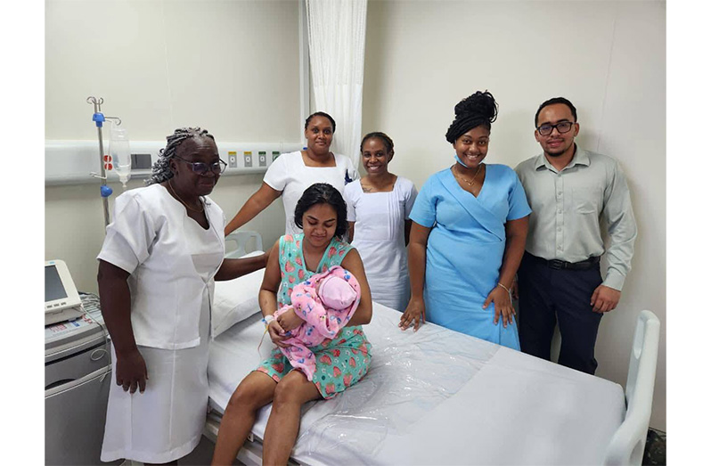 23-year-old Radha Devi Persaud shares a moment with the team at New De Kendren Regional Hospital